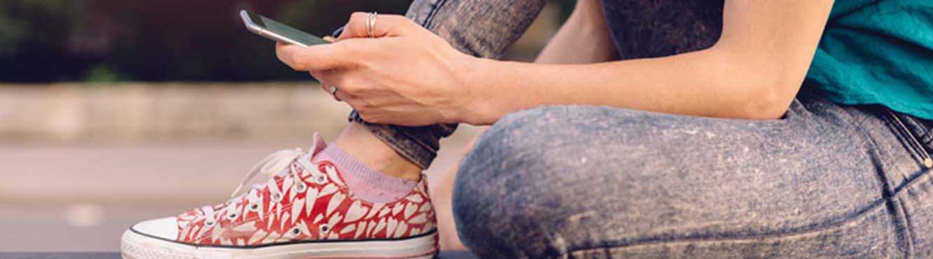 Young woman on mobile phone.