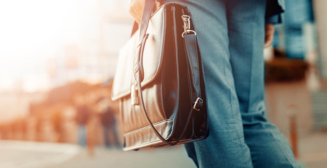 Man carrying briefcase. 