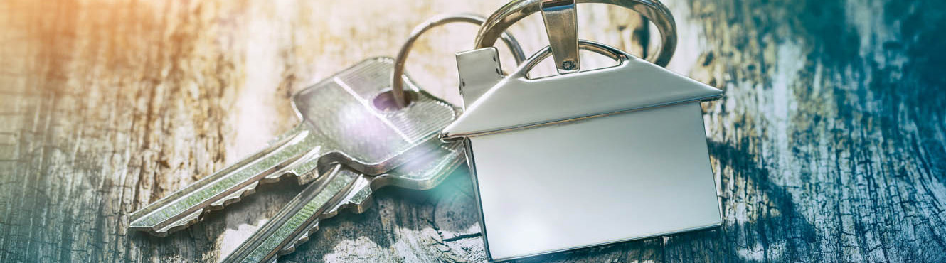 Set of keys with house key chain.