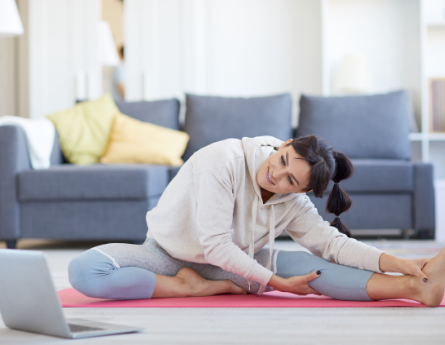 Woman doing yoga at home