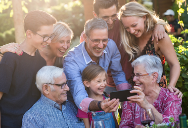 Family looking at pictures together