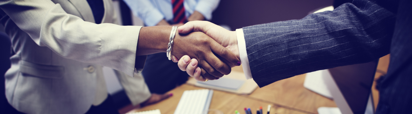 businessman and woman shaking hands