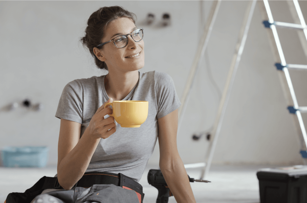 Woman taking a break from renovations
