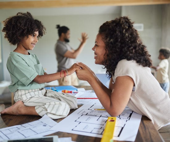 Happy family making home improvement plans