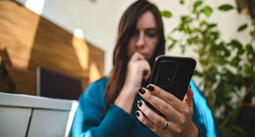 Woman concerned on phone