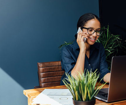 Business_Entrepreneur-on-phone-at-desk