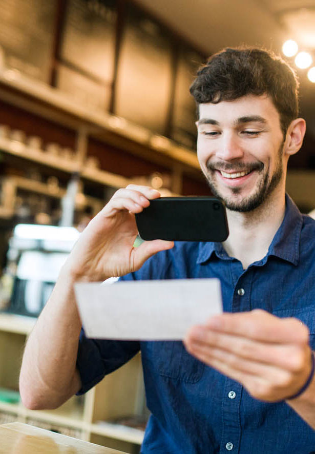 Digital-Banking_Man-Taking-Photo-of-Check