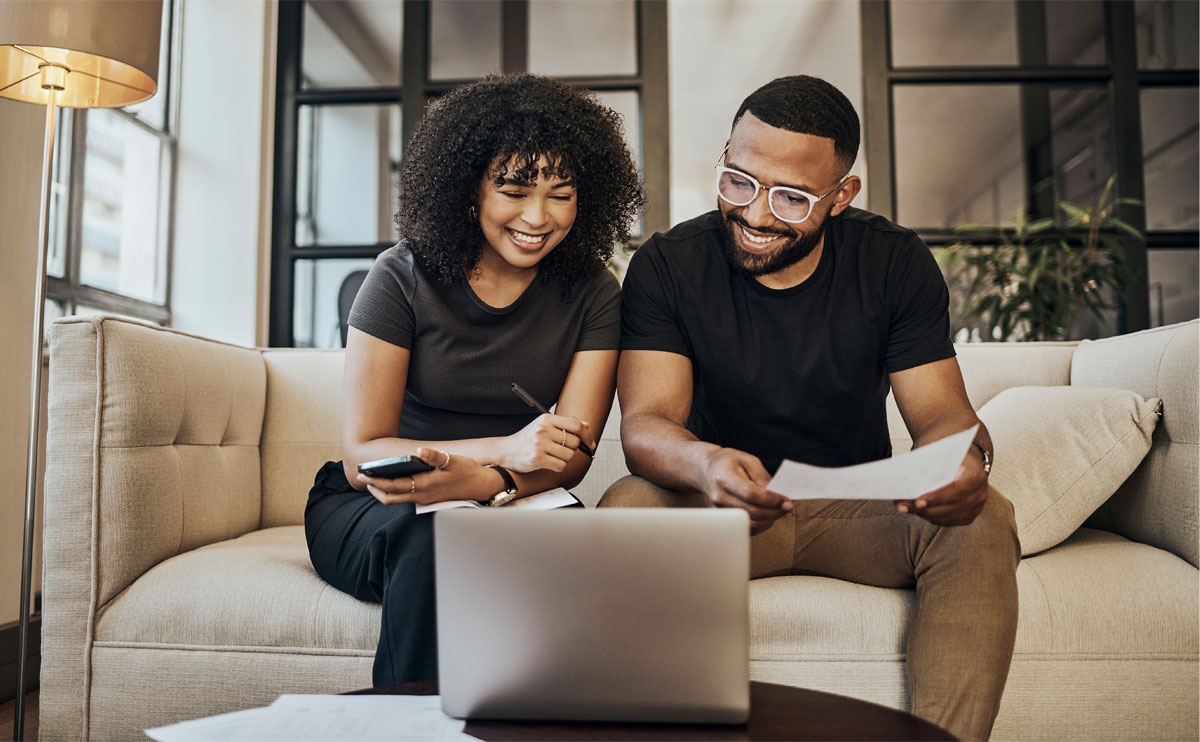 Couple working on computer together