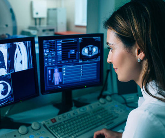 Radiologist reading a CT scan