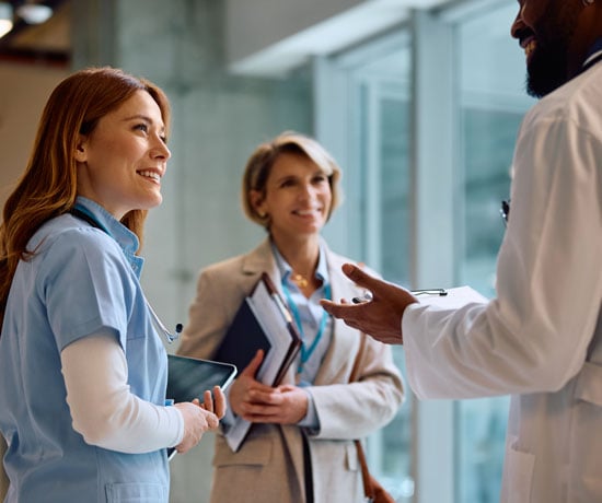 Doctors and professional talking in hall