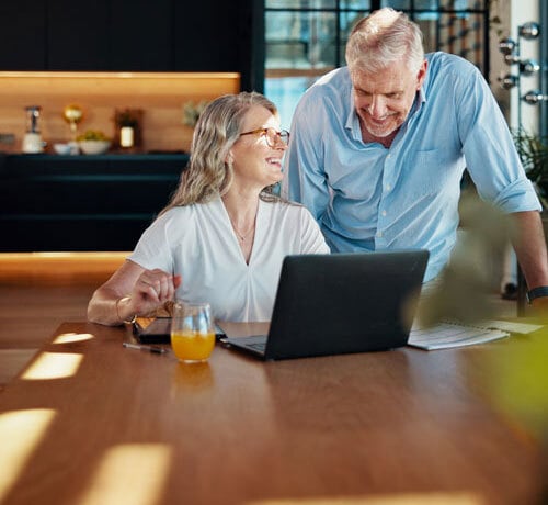 Mature couple viewing computer
